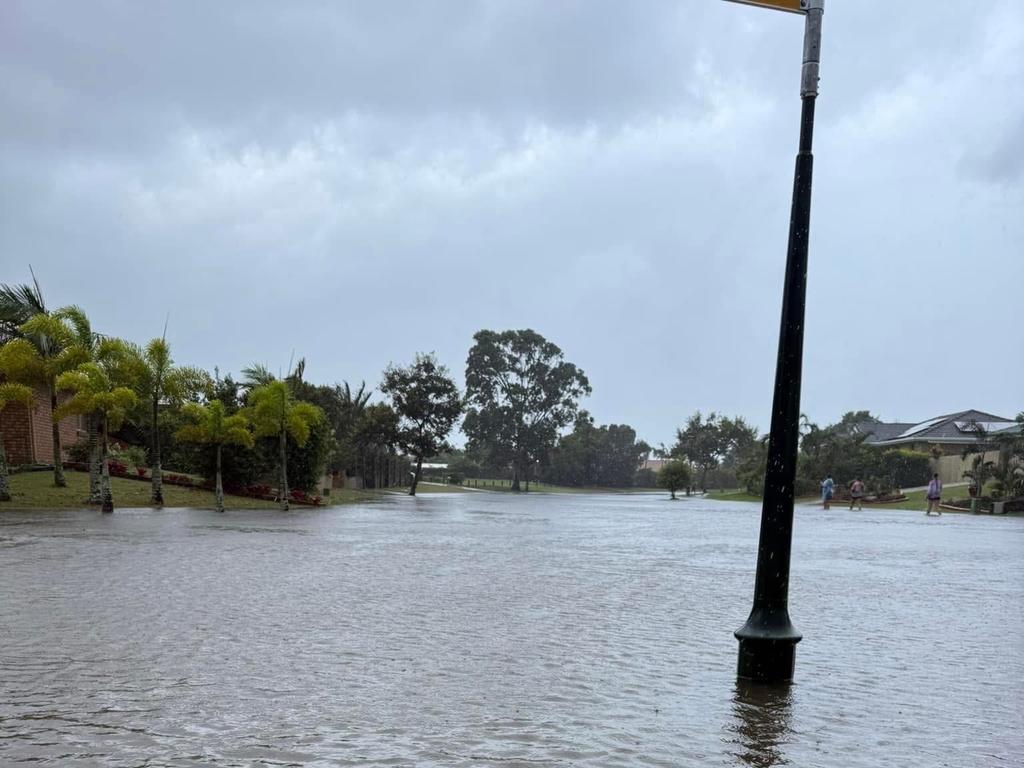 Flooding on Ibis Boulevard in Eli Waters during the wild weather brought by ex-Tropical Cyclone Alfred. Photo: Chris Bergin