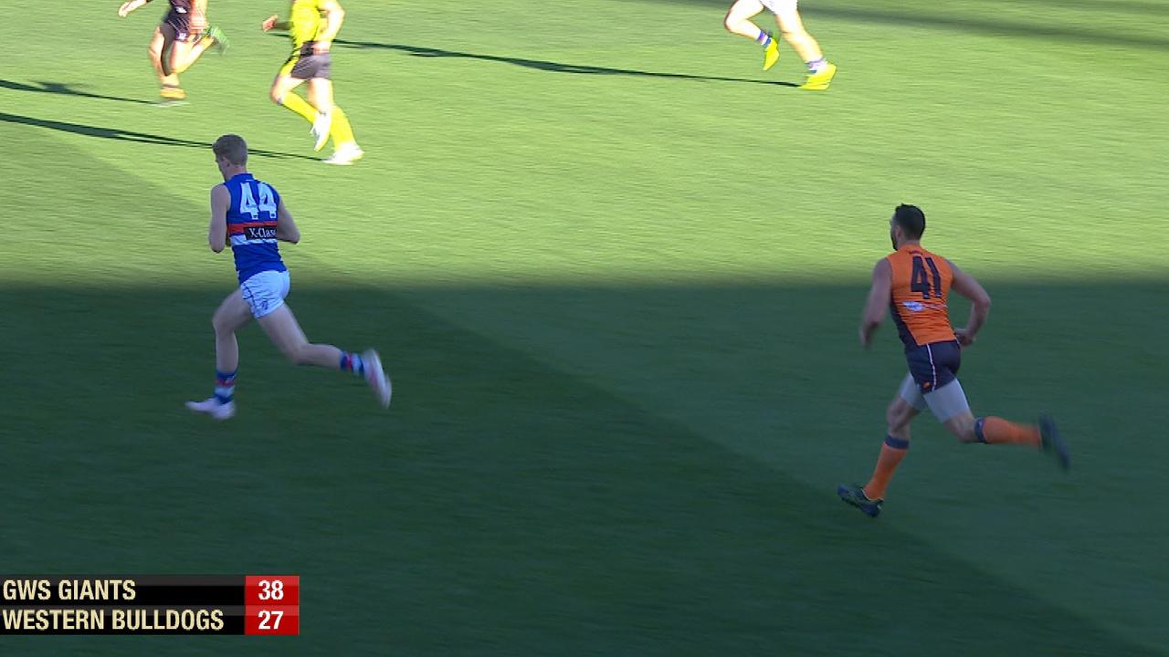 Shane Mumford watches as Tim English runs into an open goal.