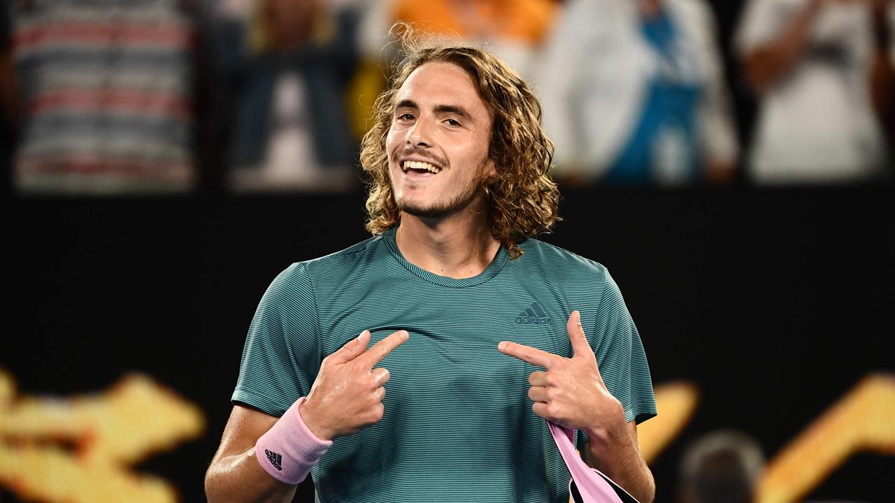 Stefanos Tsitsipas celebrates his victory against Roger Federer on Sunday night.