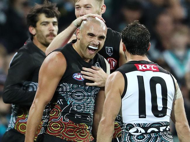 ADELAIDE, AUSTRALIA - MAY 30: Sam Powell-Pepper of the Power celebrates a goal with Travis Boak during the 2021 AFL Round 11 match between the Port Adelaide Power and the Fremantle Dockers at Adelaide Oval on May 30, 2021 in Adelaide, Australia. (Photo by Sarah Reed/AFL Photos via Getty Images)