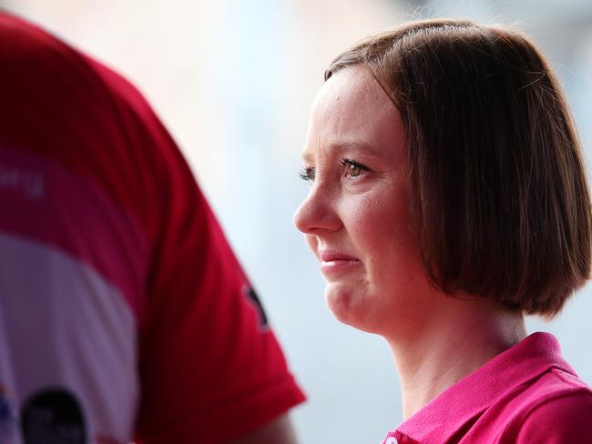 Connie sheds a tear after Samuel arrived back in Melbourne after a year riding around Australia on a unicycle in aid of breast cancer research. Picture: Mark Stewart