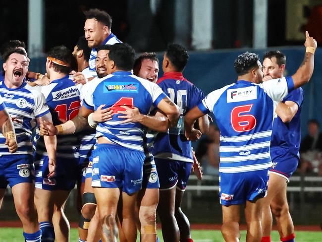 Cairns Brothers celebrate winning the FNQRL A grade premiership after beating the Ivanhoe Knights 18 points to 14 in the grand final match at Barlow Park. Picture: Brendan Radke