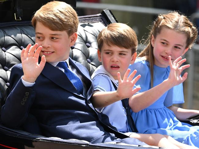 LONDON, ENGLAND - JUNE 02: Prince George, Prince Louis and Princess Charlotte in the carriage procession at Trooping the Colour during Queen Elizabeth II Platinum Jubilee on June 02, 2022 in London, England. The Platinum Jubilee of Elizabeth II is being celebrated from June 2 to June 5, 2022, in the UK and Commonwealth to mark the 70th anniversary of the accession of Queen Elizabeth II on 6 February 1952. Trooping The Colour, also known as The Queen's Birthday Parade, is a military ceremony performed by regiments of the British Army that has taken place since the mid-17th century. It marks the official birthday of the British Sovereign. This year, from June 2 to June 5, 2022, there is the added celebration of the Platinum Jubilee of Elizabeth II  in the UK and Commonwealth to mark the 70th anniversary of her accession to the throne on 6 February 1952. (Photo by Karwai Tang/WireImage)