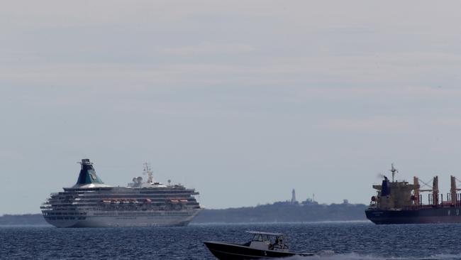 25/03/2020 West Australian medics were aboard the foreign cruise ship MV Artania (Rottnest Island in the background) as it anchored off Fremantle on Wednesday. Picture: Colin Murty/The Australian