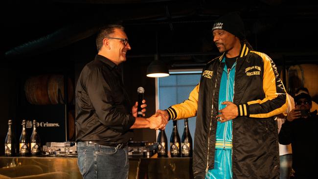 Treasury Wine Estates chief Tim Ford with 19 Crimes ambassador and US rapper Snoop Dogg.