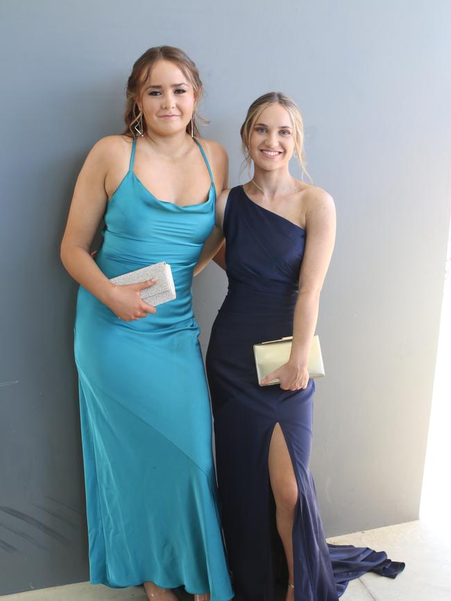 Tess Buckley and Maddy Stout arriving at their formal.
