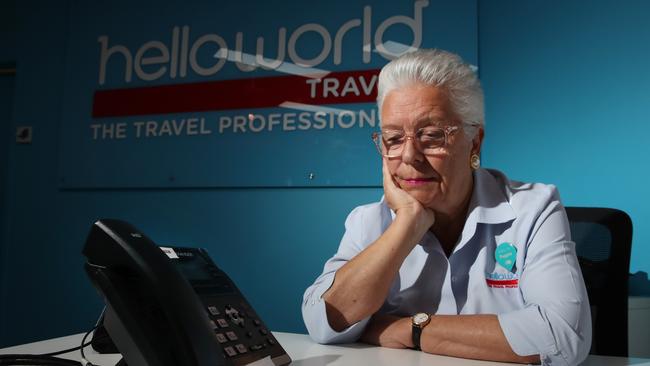 Manager Andrea Cole waits for phone inquiries at the Helloworld Mudgeeraba office. The travel agent is disheartened as the industry struggles on with  less than a third of travel agents operating on the Gold Coast compared to pre-Covid levels. Picture Glenn Hampson