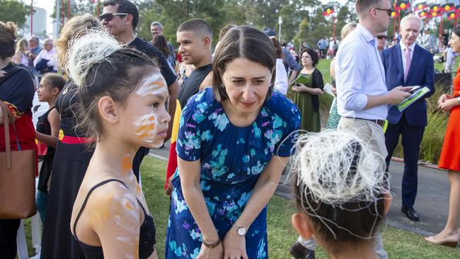 Gladys Berejiklian with Koomurri dancers during the WugulOra Morning Ceremony. Picture: AAP