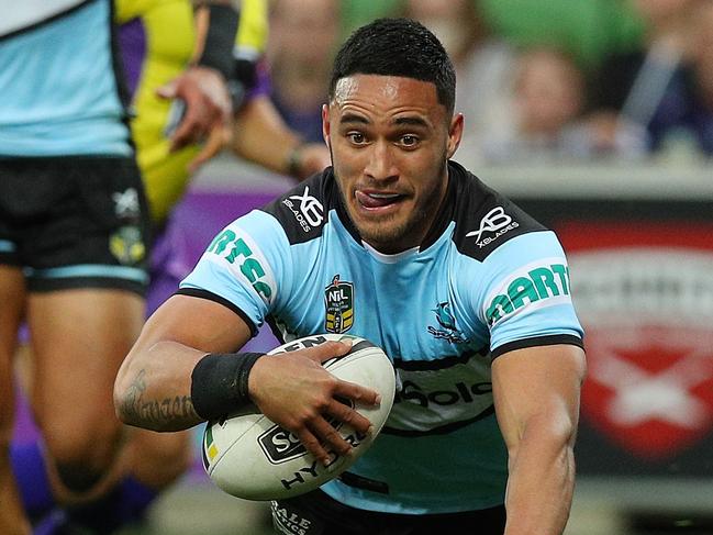 MELBOURNE, AUSTRALIA - AUGUST 12:  Valentine Holmes of the Sharks scores a try during the round 22 NRL match between the Melbourne Storm and the Cronulla Sharks at AAMI Park on August 12, 2018 in Melbourne, Australia.  (Photo by Graham Denholm/Getty Images)