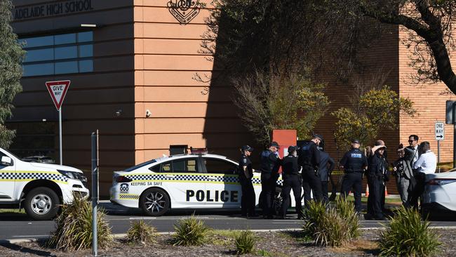 Police at the scene at Adelaide High School on West Terrace after a man was left in a critical condition after being assaulted by four men. Picture: Naomi Jellicoe