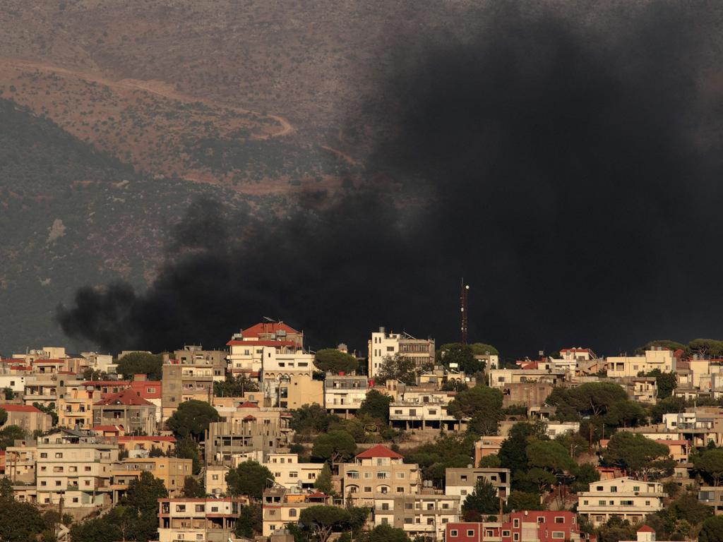 Smoke billows during Israeli bombing on the southern Lebanese village of Khiam amid ongoing cross-border clashes between Israeli troops and Hezbollah fighters. Picture: AFP