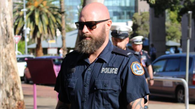 Constable James Kirstenfeldt outside the Alice Springs Local Court during an inquest into the death of Kumanjayi Walker. Picture: Jason Walls