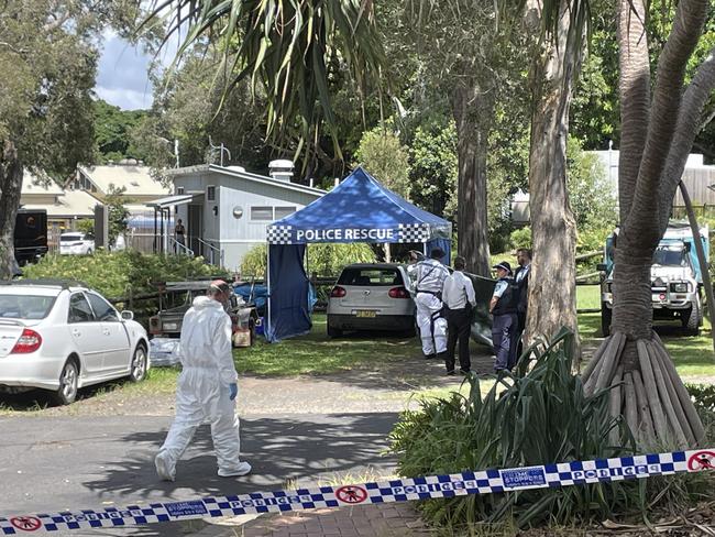 The body of a woman being removed from a crime scene in Evans Head. The body of the woman, 60, was found in the boot of a white Volkswagen hatchback. Picture: Savannah Pocock