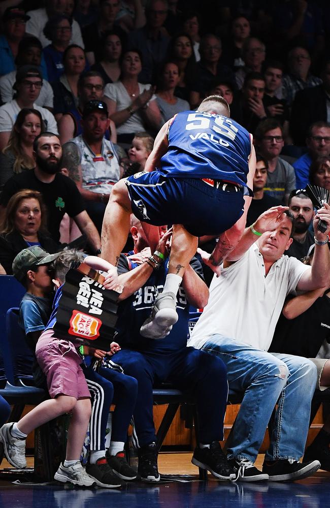 Creek smashes into Harry as he tried to avoid the fans. Picture: Mark Brake/Getty