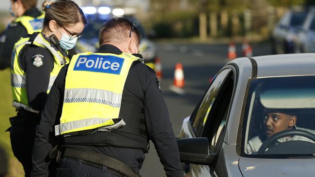 The Police Minister can now martial any public agency, such as the Police, to aid in the fight against COVID-19. Picture: Darrian Traynor/Getty Images