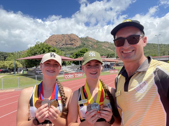 RenÃ¨ Doel of Runaway Bay Little Athletics club with his twin daughters