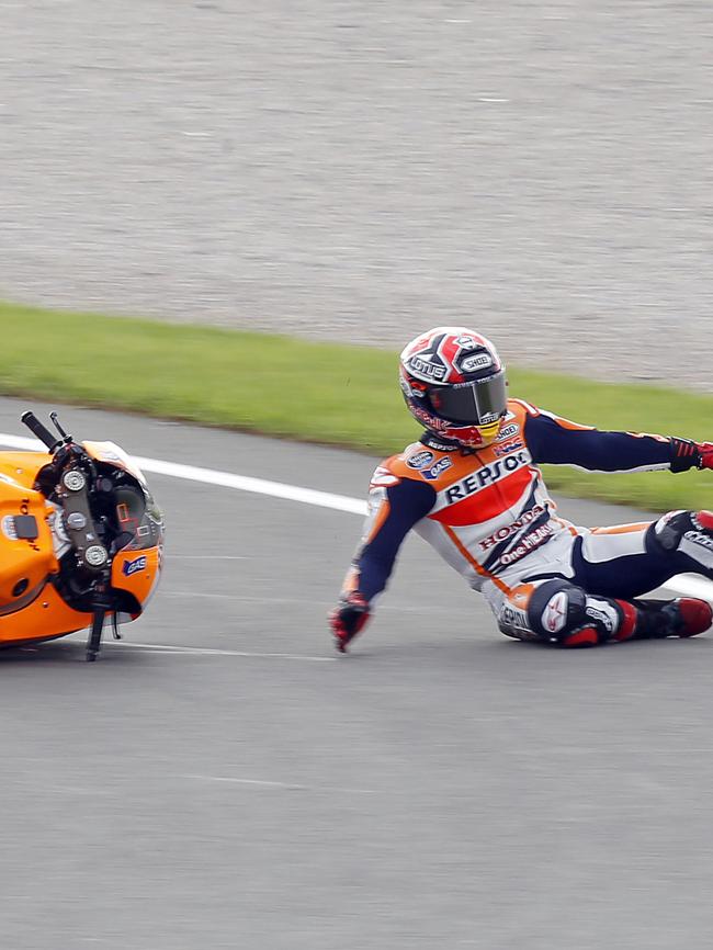 Marc Marquez of Spain falls from his bike Spain's Valencia Motorcycle Grand Prix, the last race of the season, Picture: AP Photo/Alberto Saiz.