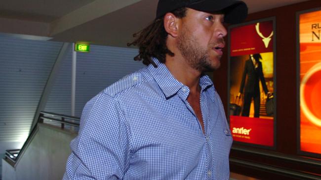 Andrew Symonds at Darwin Airport after being kicked off the tour. Picture: Chloe Erlich.