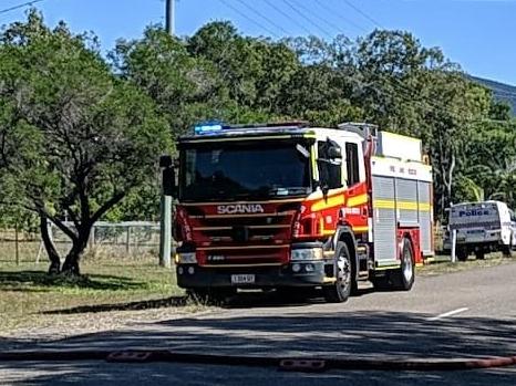 Firefighters at the scene of a house fire on Mystic Ave, Balgal Beach. Photo: Matt Taylor