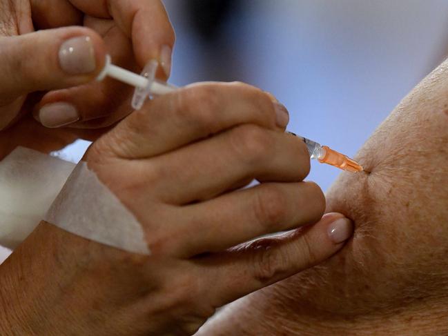 SYDNEY, AUSTRALIA - NewsWire Photos FEBRUARY, 22, 2021: Residents are seen receiving their first dosage of the Pfizer COVID-19 vaccination at Uniting Banks Lodge Peakhurst Aged Care, in Sydney. Australia has begun its Pfizer COVID-19 vaccination rollout this morning, with hopes 60,000 doses will be administered by the end of the week. NCA NewsWire/Bianca De Marchi