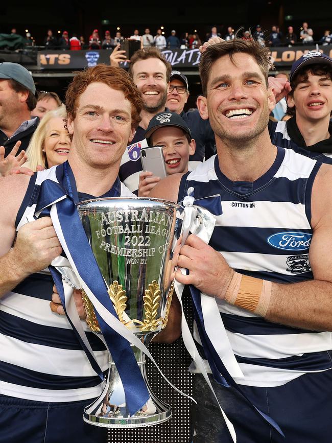 Gary Rohan and Tom Hawkins with Geelong’s 2022 premiership cup. Picture: Mark Stewart