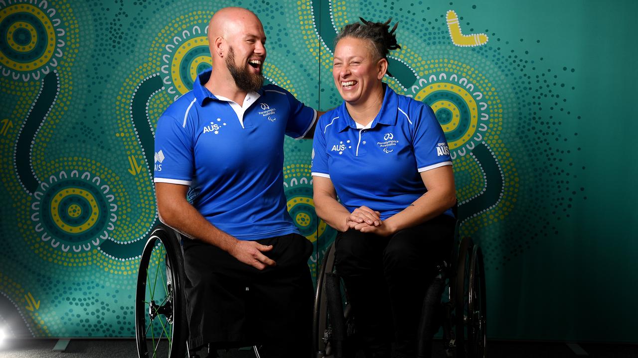 Australian Paralympic team co-captains Ryley Batt and Danni Di Toro share a laugh before heading to Tokyo. Picture: AAP/Dan Himbrechts