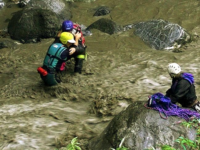 The flood waters were still raging when emergency rescue workers began looking for survivors.