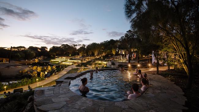 Bathing in the amphitheatre at twilight, Peninsula Hot Springs.