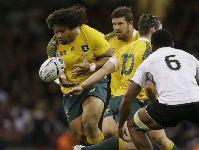 Tatafu Polota-Nau charges onto the ball.