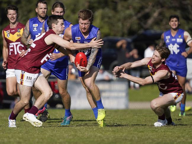 Hastings player Ben Schroen with the ball. Picture: Valeriu Campan