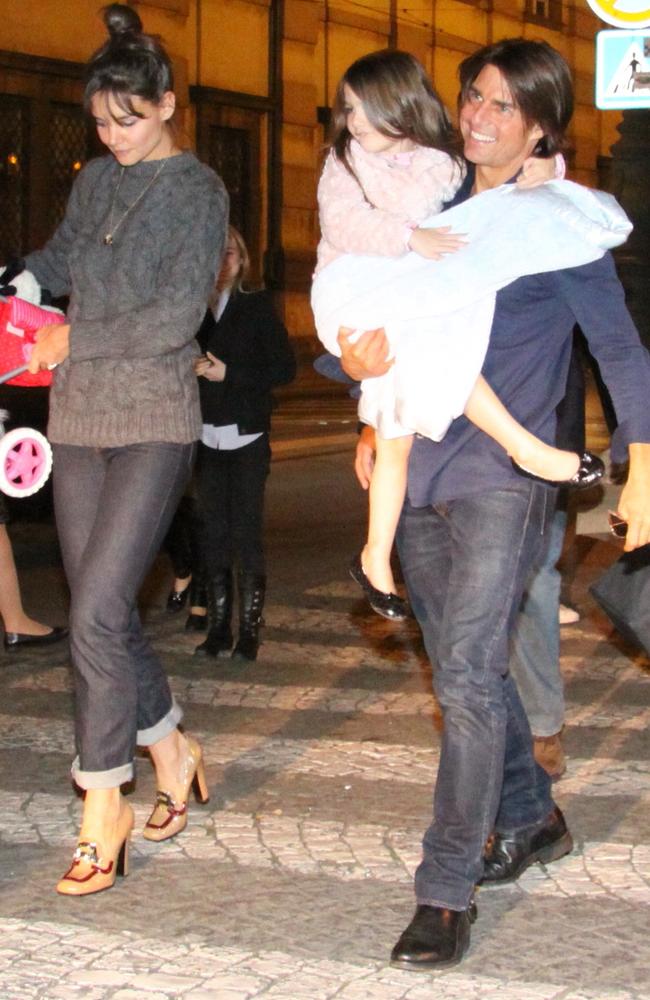 Tom Cruise, Katie Holmes and Suri spotted out in Prague to head to a restaurant in 2010