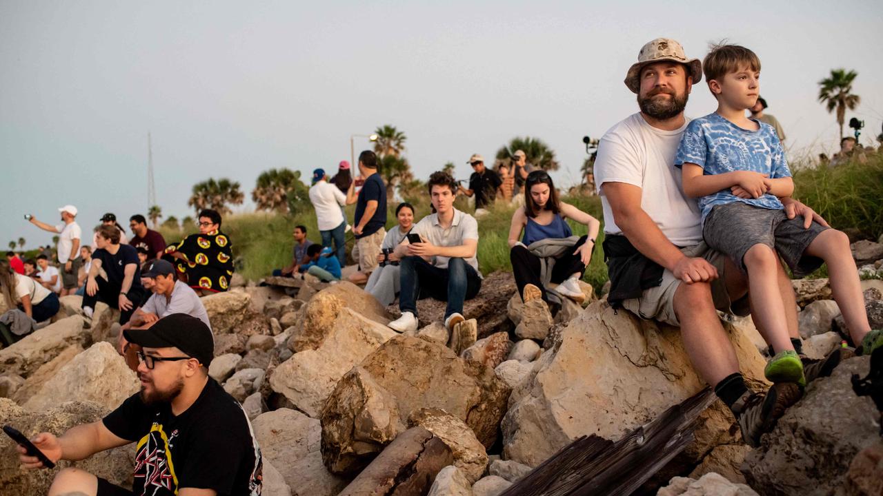 A crowd gathered to watch the launch. Picture: Sergio Flores/AFP