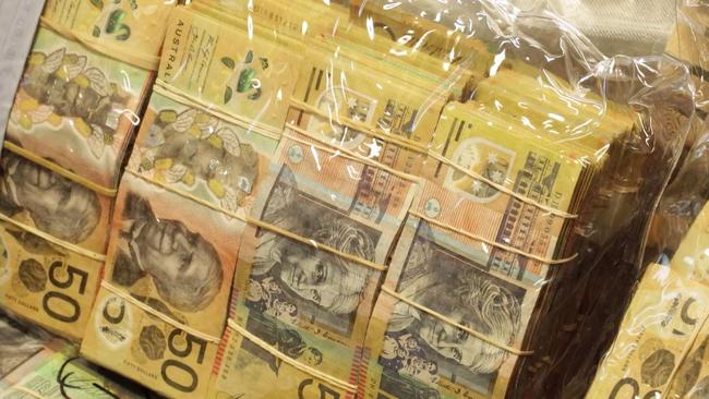 About $640,000 cash was seized during a police operation targeting a Comancheros drug syndicate in Brisbane's bayside.