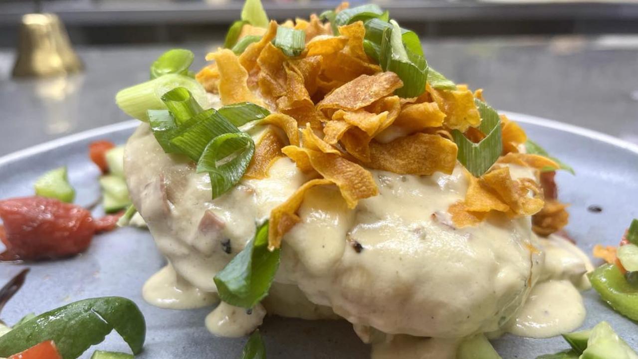 The Hinchinbrook Hotel’s Harvest Restaurant serving up a moist chicken scaloppini featuring grilled chicken breast with pan-fried prosciutto in a rich, creamy sauce and served with broccoli and mashed potatoes. Picture: Cameron Bates
