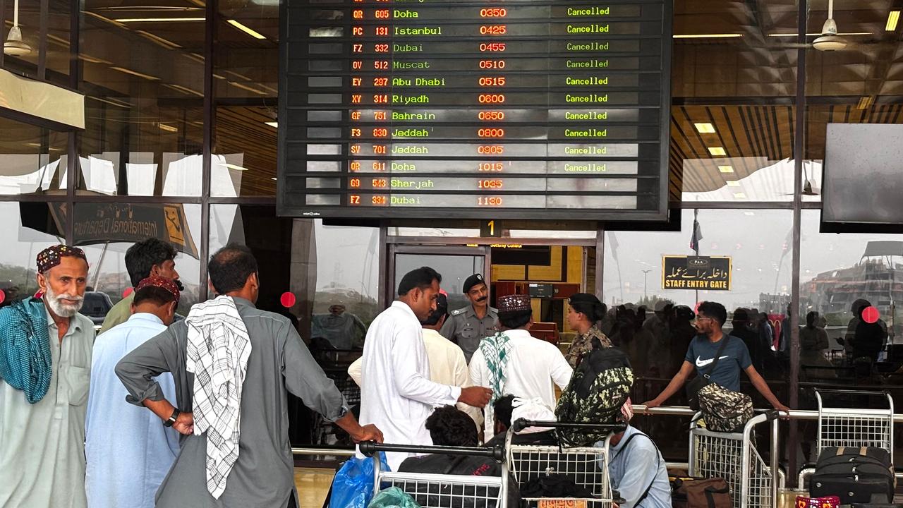 Passengers wait at Jinnah International Airport after all domestic and international flights were cancelled in Karachi on May 7, 2025. Picture: Asif Hassan / AFP