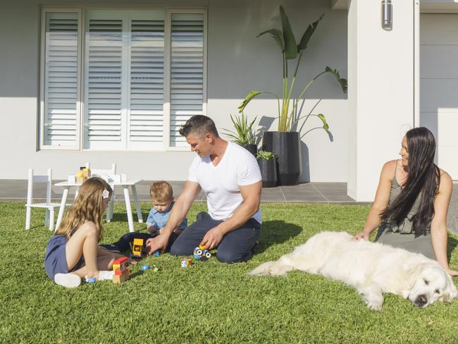 Luke and Melissa Lilburn, with their children Molly and Archie, built a custom home Picture: Nick Clayton