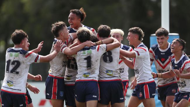 The Roosters celebrate their victory. Picture: Sue Graham