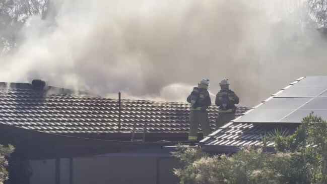 Firies unable to enter home after house goes up in flames