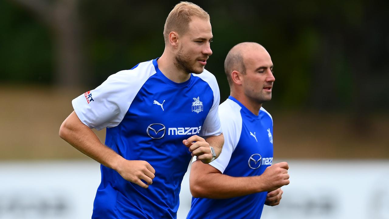 Ben Cunnington, right, at Kangaroos training. Picture: Quinn Rooney/Getty Images