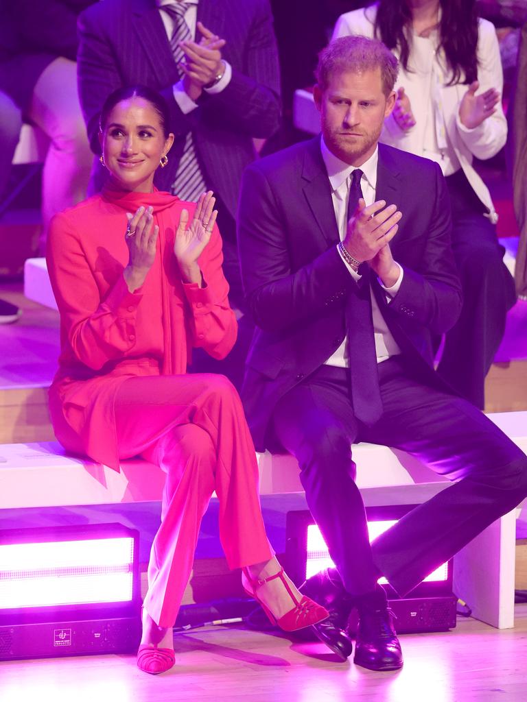 MANCHESTER, ENGLAND - SEPTEMBER 05: Prince Harry, Duke of Sussex and Meghan, Duchess of Sussex sit onstage during the Opening Ceremony of the One Young World Summit 2022 at The Bridgewater Hall on September 05, 2022 in Manchester, England. The annual One Young World Summit brings together more than two thousand of the brightest young leaders from every country and sector, working to accelerate social impact both in-person and digitally. Meghan is a counsellor for the organisation, alongside Justin Trudeau, Sir Richard Branson, and Jamie Oliver, among others. (Photo by Chris Jackson/Getty Images)