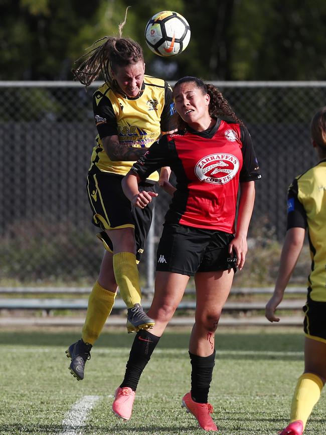 Siobhan Macken and Ciara Fowler jump up for a header. PICTURE: BRENDAN RADKE