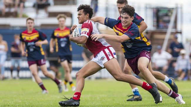 James Bowland (left) of Redcliffe Dolphins is tackled by Bailey Rathmell of Western Mustangs in Cyril Connell Challenge earlier in the season. Picture: Kevin Farmer