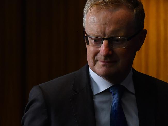 Governor of the Reserve Bank of Australia (RBA) Phillip Lowe arrives to speak to the media during a press conference in Sydney, Tuesday, April 21, 2020. (AAP Image/Joel Carrett) NO ARCHIVING