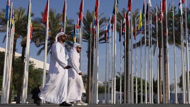 Participants attend day eleven of the COP28 summit in Dubai.