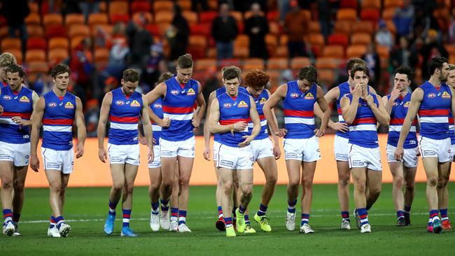 Bulldogs players leave the field after the AFL elimination match between the GWS Giants and Western Bulldogs at Giants Stadium. Picture. Phil Hillyard