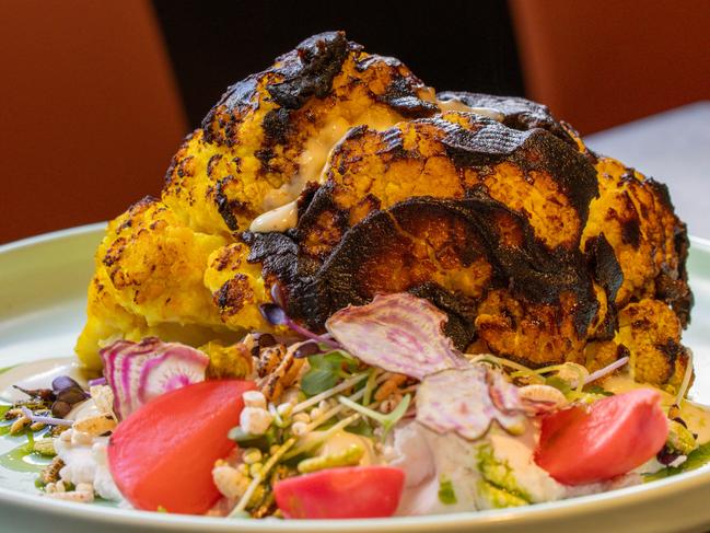 The Waggon’s rotisserie cauliflower with coconut yoghurt, tahini and coriander oil, is a lovely dish and an excellent vegetarian option. Picture: Linda Higginson