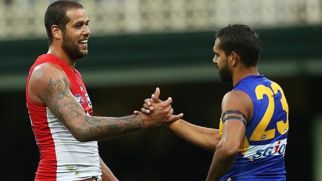 Former teammates Sydney's Lance Franklin and West Coast's Lewis Jetta come together at the conclusion of AFL match Sydney Swans v West Coast Eagles at the SCG. The Swans winning by 39 points. Picture. Phil Hillyard