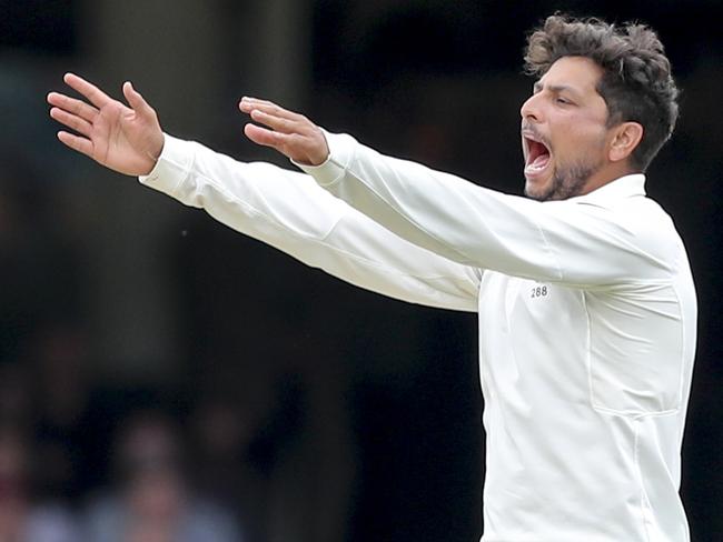 Kuldeep Yadav of India appeals for the wicket of Nathan Lyon of Australia who is given out LBW on day four of the Fourth Test match between Australia and India at the SCG in Sydney, Sunday, January 6, 2019. (AAP Image/David Neilson) NO ARCHIVING, EDITORIAL USE ONLY, IMAGES TO BE USED FOR NEWS REPORTING PURPOSES ONLY, NO COMMERCIAL USE WHATSOEVER, NO USE IN BOOKS WITHOUT PRIOR WRITTEN CONSENT FROM AAP