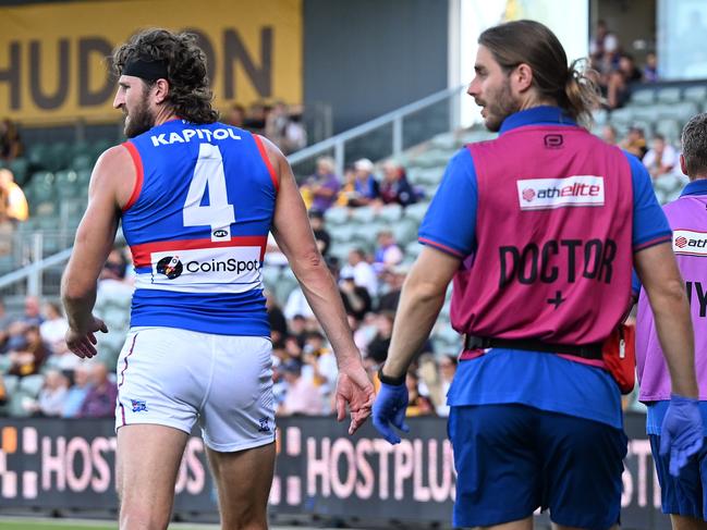 LAUNCESTON, AUSTRALIA - FEBRUARY 27: Marcus Bontempelli   of the Bulldogs leaves the field injured during the 2025 AAMI AFL Community Series match between the Western Bulldogs and the Hawthorn Hawks at University of Tasmania Stadium on February 27, 2025 in Launceston, Australia.  (Photo by Steve Bell/Getty Images)