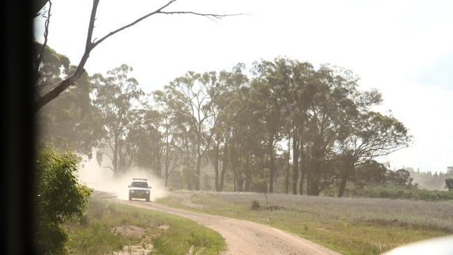 Police move in during the operation that ended the Stoccos’ long run from the law. Picture: Neil Keene